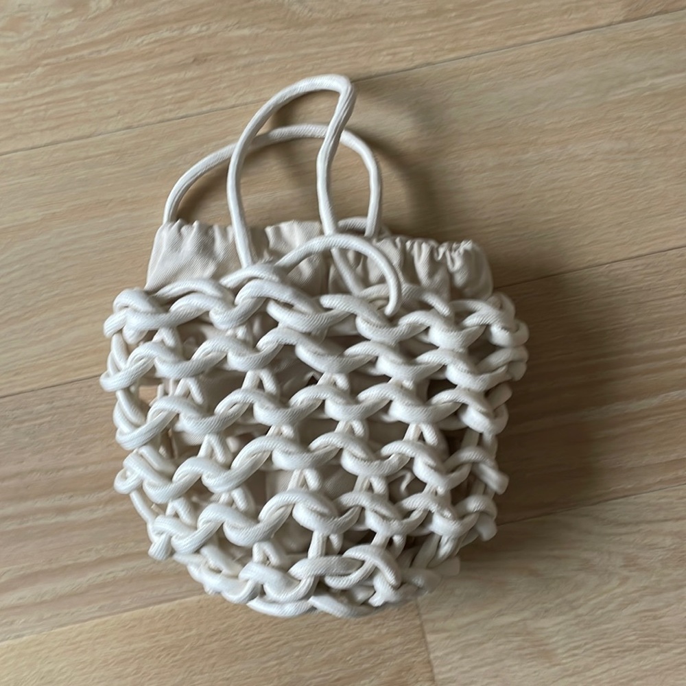 White rope satchel made in Italy. “Avant-garde organic design”
